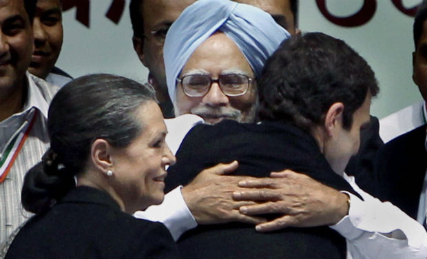 Prime Minister Dr Manmohan Singh hugs Congress Vice President Rahul Gandhi (Photo: PTI) Prime Minister Dr Manmohan Singh hugs Congress Vice President Rahul Gandhi (Photo: PTI)